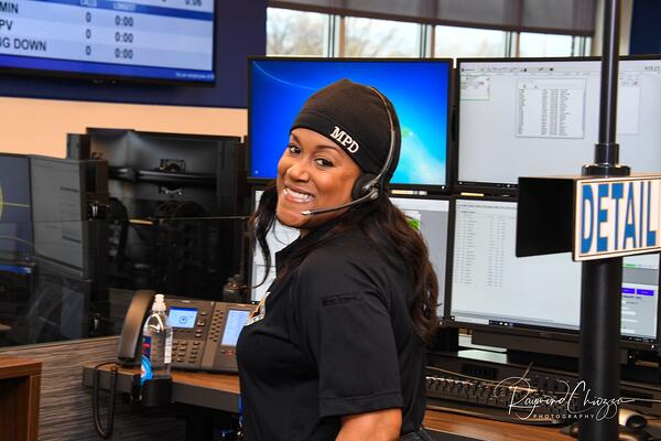 smiling operator standing